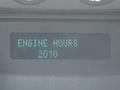 A display screen shows the text ENGINE HOURS followed by the number 2010 in a digital format