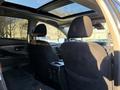Interior view of a 2021 Nissan Murano showcasing the back seats and a sunroof