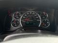 Dashboard of a 2020 Chevrolet Express showing speedometer fuel gauge and various warning lights