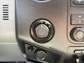 Close-up of the control panel in a 2015 Ford F-550 featuring a dial for selecting 2H 4H and 4L drive modes