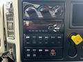 Dashboard of a 2017 International WorkStar 7600 featuring climate controls audio system and multiple buttons for various functions