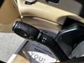Close-up of the turn signal and headlight control stalk from a 2000 Ford Motorhome showing various switch positions and markings
