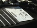A label on a 2023 RAM 3500 engine with text indicating FCA branding and a barcode for identification purposes