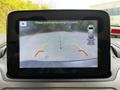Rearview camera display showing guidelines for parking in a 2019 Ford Transit Connect