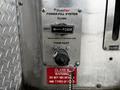 2009 Spartan Gladiator FoamPro power-fill system panel with buttons and warnings for foam mixing and drainage instructions