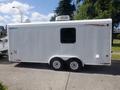 A 2004 Royal 18 Foot Office Trailer with a white exterior and two wheels visible on the bottom side