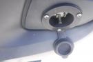 Close-up of a fuel filler cap and nozzle of a 2012 Mercedes-Benz Sprinter