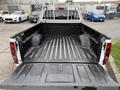 Image of the bed of a 2012 GMC Canyon truck showing a rugged surface with no cargo and side walls extending upward