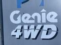 1997 Genie S-65 4X4 with large white lettering displaying the brand name Genie and the term 4WD