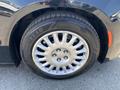 Close-up of a silver wheel with a Goodyear tire on a 2019 Dodge Charger