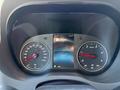 Dashboard of a 2023 Mercedes-Benz Sprinter showing speedometer and tachometer with digital display in the center