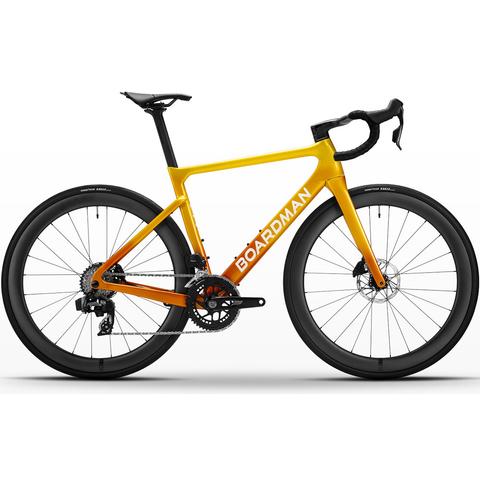 2026 Boardman SLR 9.4 Carbon Ltd Edition Race Road Bike in orange and yellow with a sleek aerodynamic design and thin black wheels