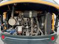 The image shows the engine compartment of a 2022 Hyundai R55-9A with several visible components including hoses pipes and a large air filter