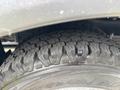 Close-up of a tire from a 2020 Chevrolet Express showing detailed tread pattern