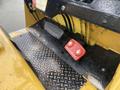 A close-up view of the control panel of a 2010 Hyster S80XLBCS forklift featuring foot pedals and a textured floor plate