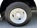 Close-up of a wheel on a 2009 Morgan Olson Workhorse featuring a silver rim and a black tire with the size 245/70 R 16