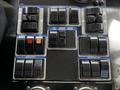 Control panel of a 2012 Autocar Xpert featuring various switches for beacons, lights, water functions, and vacuum control
