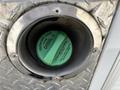 Green diesel fuel cap with instructions for tightening on a 2009 Ford F-550