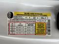 A tire and loading information sticker for a 2018 Ford F-150 detailing seating capacity and tire pressure specifications