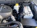 2017 RAM 1500 engine compartment showing the diesel engine battery and fluid reservoir