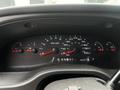 Dashboard of a 2008 Ford Econoline featuring speedometer oil pressure temperature fuel and RPM gauges with visible readings and indicator lights