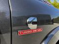 Close-up of the 2022 RAM 3500 badge featuring the Cummins logo and Turbo Diesel text in red on the vehicle's side panel