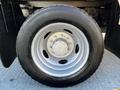 Close-up of a silver wheel on a 2008 Ford F-450 SD showing the tire tread and rim details