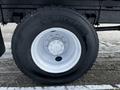 Wheel of a 2019 Hino 338 24 Foot Cube truck featuring a white rim and a Michelin tire with visible tread design