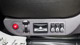 The image shows the control panel on the driver's side of a 2019 Western Star Trucks 4900 featuring buttons for seat adjustments and a red emergency button