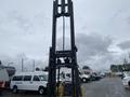 A 2010 Hyster S80XLBCS forklift featuring a tall lifting mast and four large tires designed for material handling and loading tasks