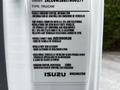 2018 Isuzu NPR vehicle emissions control label with various regulatory information and identifiers