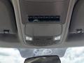 Interior view of a 2017 Ford F-550 roof console showing controls for lights and auxiliary switches
