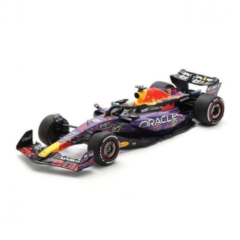 Spark Red Bull RB19 model car featuring #1 M Verstappen in a vibrant red and purple design with sponsor logos and detailed features of the 2023 Las Vegas Grand Prix version
