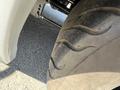 Close-up of a tire of a 1962 Ford F-100 showing tread patterns and texture with a focus on the curves of the rubber