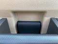 The image shows the interior handle of a 2013 Ford F-450 SD designed for opening the door