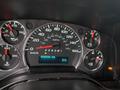 Dashboard of a 2017 Chevrolet Express showing speedometer fuel gauge and odometer with a reading of 488855 km and temperature display at 9 degrees Celsius