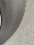 A close-up of a tire labeled LT225/75R16 on a 2018 Chevrolet Express