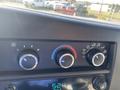 Climate control knobs for a 2012 GMC Savana with dials for temperature and air flow settings