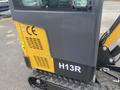 Side view of a 2024 AGT Industrial H13R Mini Excavator showcasing its yellow and black exterior with model number H13R prominently displayed