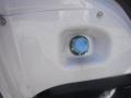 Close-up of a blue coolant reservoir cap on a 2005 Freightliner M2 106 Medium Duty truck