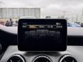 Dashboard display of a 2016 Mercedes-Benz GLA-250 featuring navigation and media options