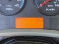 Dashboard display of a 2008 International 7500 showing RPM speedometer and hour meter reading 10935 hours