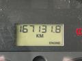 A digital odometer display showing 167131.8 kilometers with a warning light and the word ENGINE visible