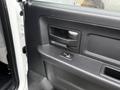Interior door handle and control panel of a 2013 RAM 3500 truck