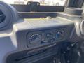 The interior dashboard of a 2018 Kubota RTV-X 1100 C featuring control knobs for air conditioning and heater settings