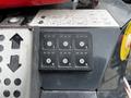 Control panel with eight buttons labeled 1 through 8 featuring circular indicators on a machinery interface
