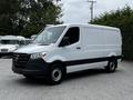 2020 Mercedes-Benz Sprinter van with a white exterior and black accents in a partial profile view