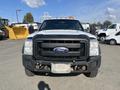2015 Ford F-450 Super Duty truck with a black grill and a white body facing forward
