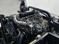 Engine of a 2020 Hino 155 showing various components including pipes wires and the intake manifold