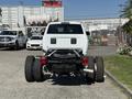 A 2022 RAM 5500 truck viewed from the rear with exposed chassis and dual rear wheels